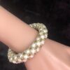 Image for Kiss Kross cream shell and gold bracelet 3